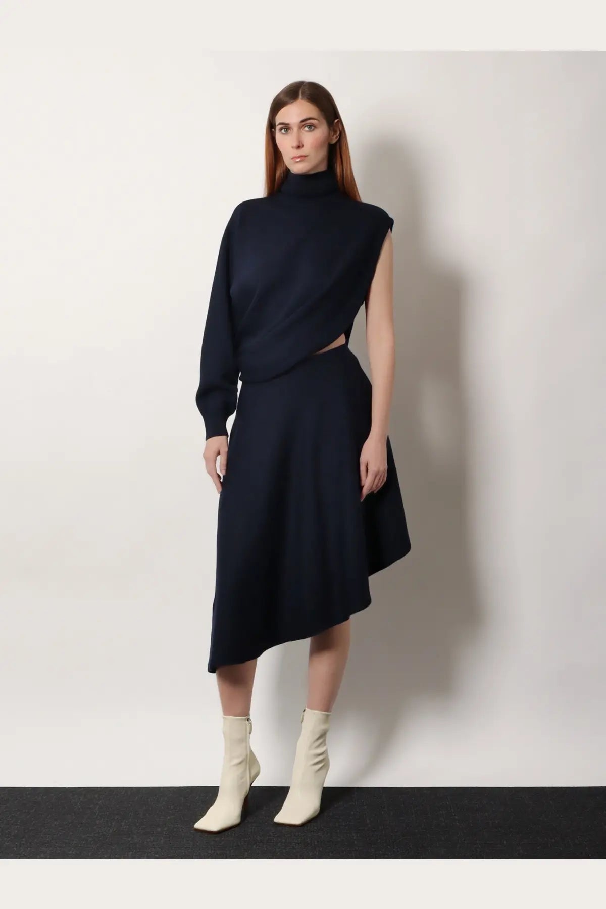 Alaïa women’s navy blue asymmetrical knit wool dress with high neckline and side cutouts