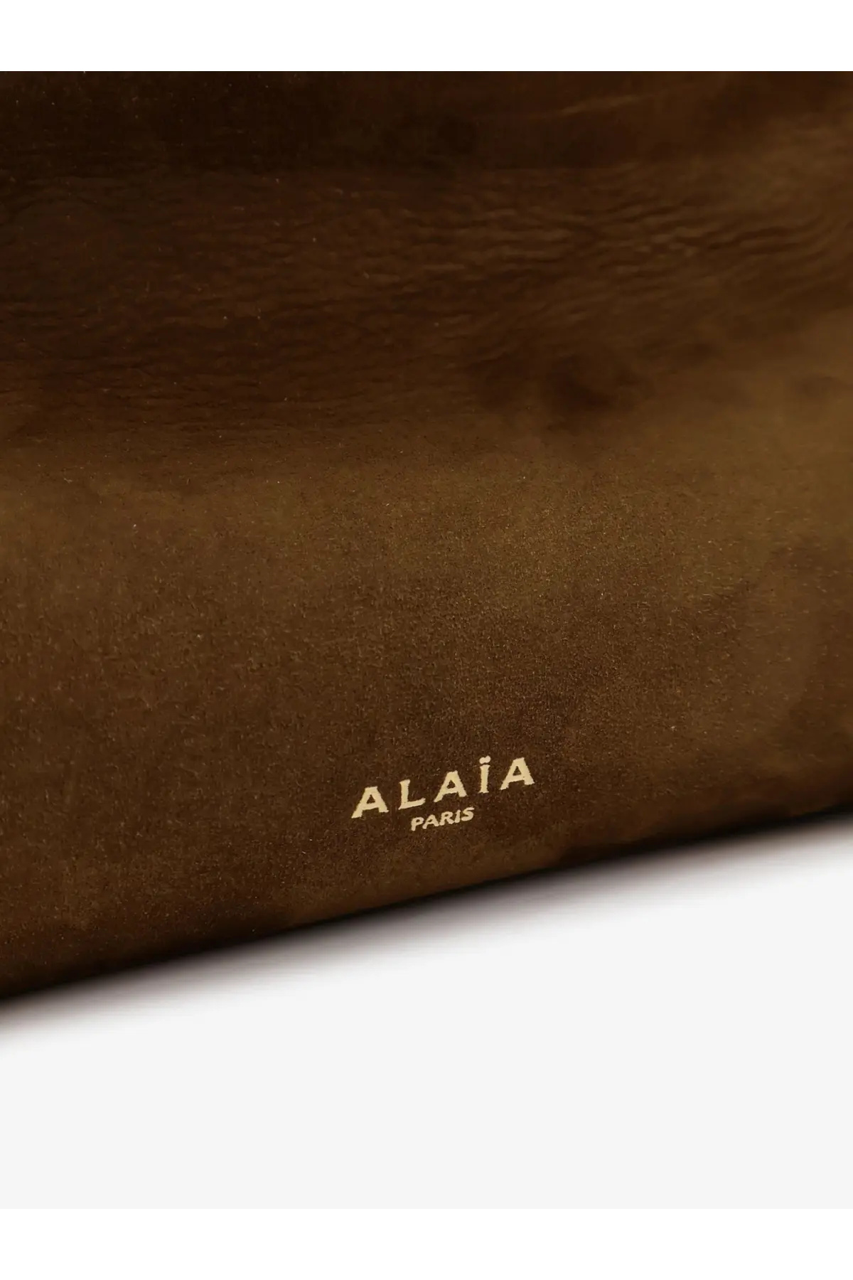 Brown suede clutch with gold foil alaïa paris branding for a women’s leather shoulder bag in green
