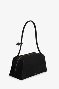 Alaïa women’s le bouledogue nubuck black leather shoulder bag with gold-tone zipper and minimalist design