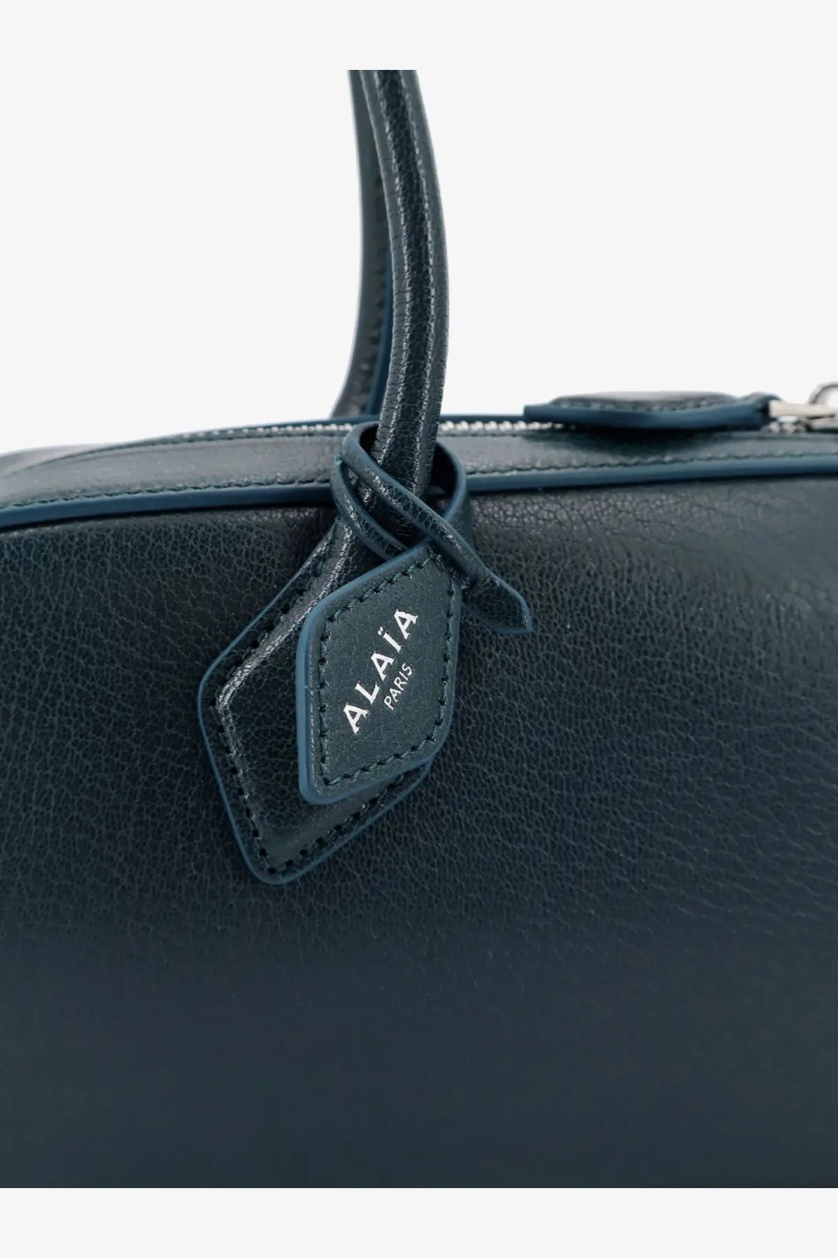 Dark blue leather ALAÏA women’s Le Teckel shoulder bag with matching handle and stitched Alaïa Paris tag