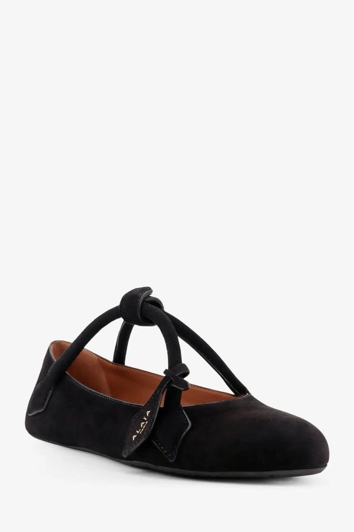 Alaïa women’s le teckel black suede mary jane flat with tied bow detail and leather tag on the front side