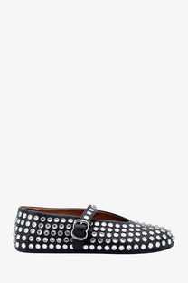 Alaïa women’s black leather mary jane flats with dense silver stud pattern on upper and strap