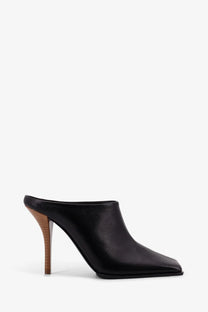 Alaïa women’s black leather mule sandal with wooden heel shown from the back side