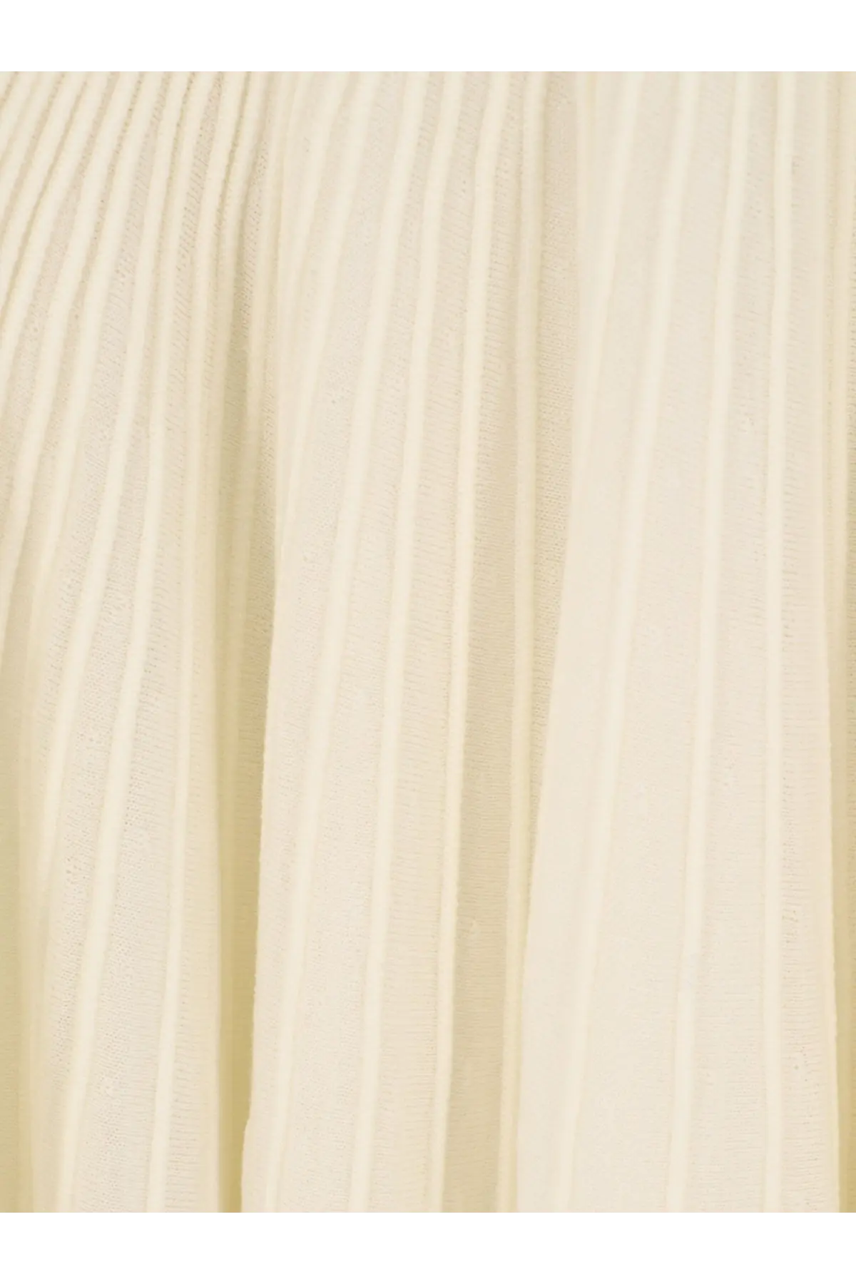 Alaïa women’s long wool dress in white featuring cream-colored pleated fabric with vertical ridges