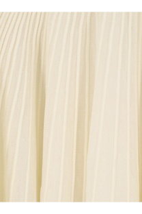 Alaïa women’s long wool dress in white featuring cream-colored pleated fabric with vertical ridges