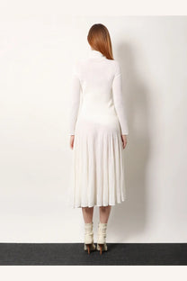 Alaïa women’s white long wool dress with a high neckline ribbed knit top and pleated midi skirt