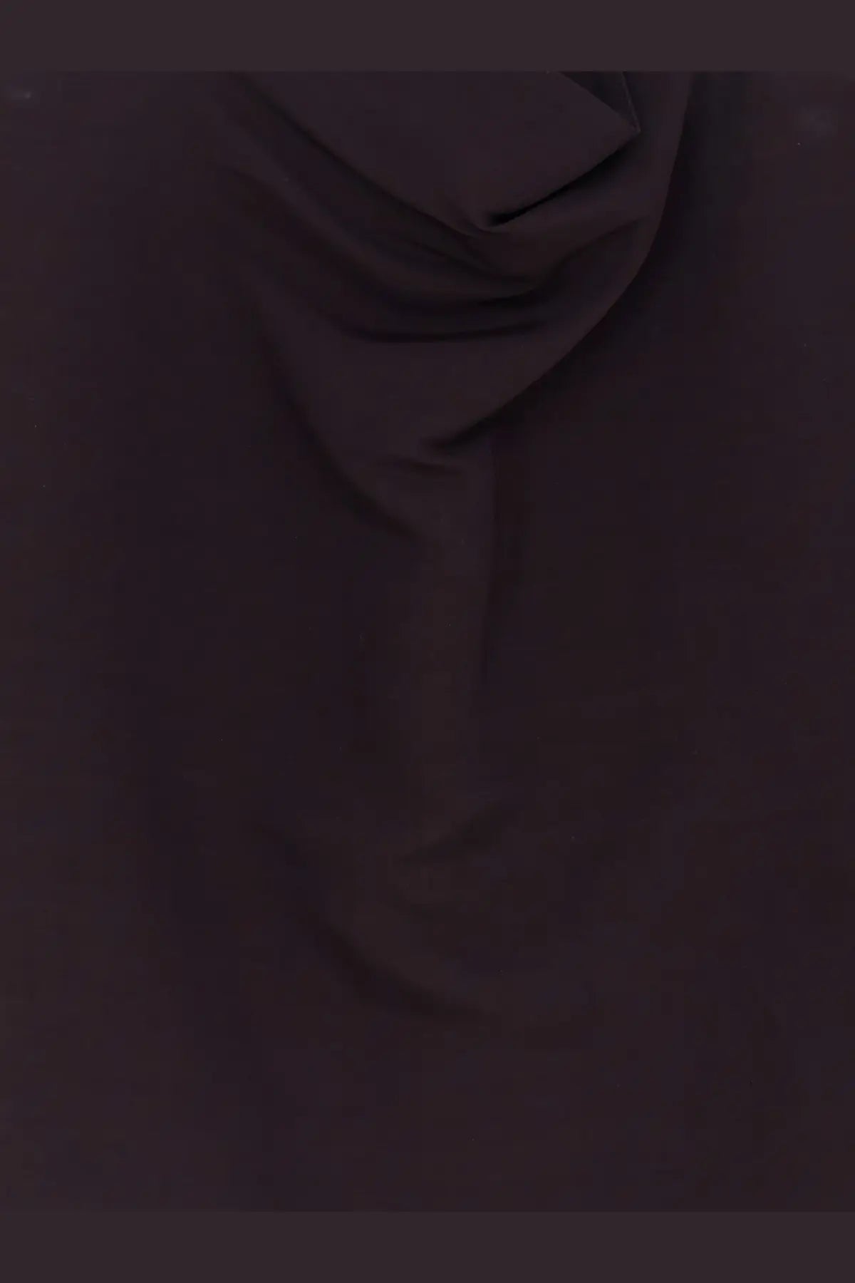 A purple alaïa women’s paper and viscose top made of dark smooth fabric with soft folds and subtle sheen