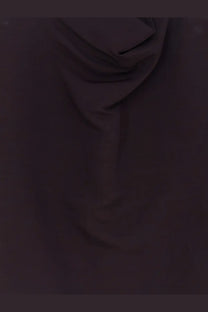 A purple alaïa women’s paper and viscose top made of dark smooth fabric with soft folds and subtle sheen