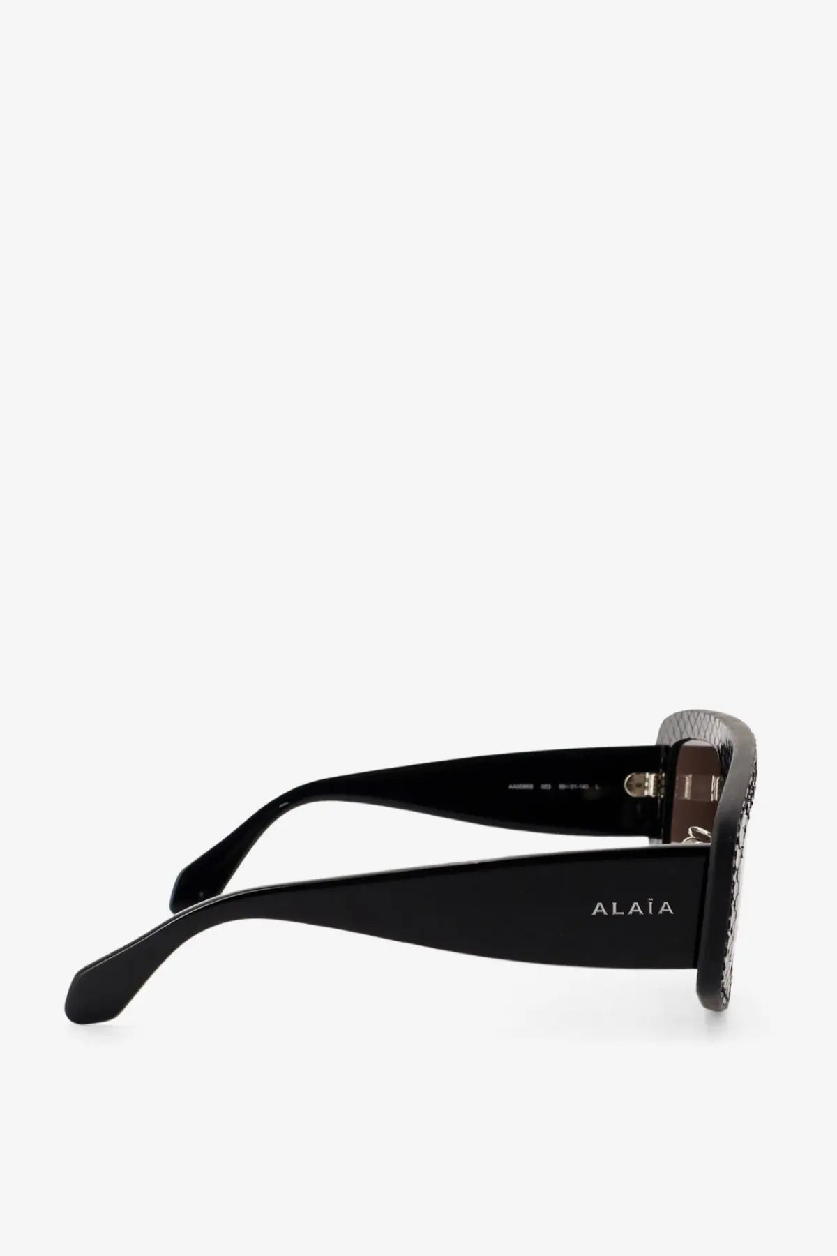 Alaïa women’s black texturized acetate sunglasses with sleek modern design and textured temple tips