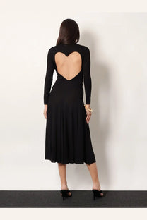 Back view of alaïa womens black viscose long sleeve midi dress with heart shaped cutout at the back