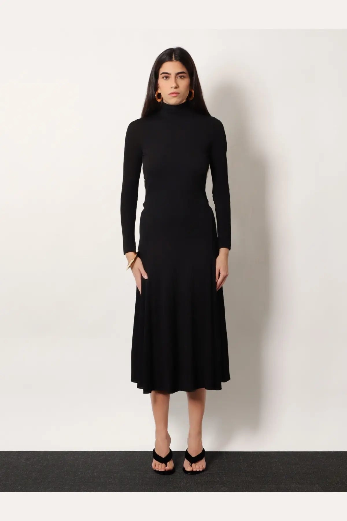 Alaïa women’s black viscose long heart dress with fitted bodice and flared skirt in a long-sleeved turtleneck style