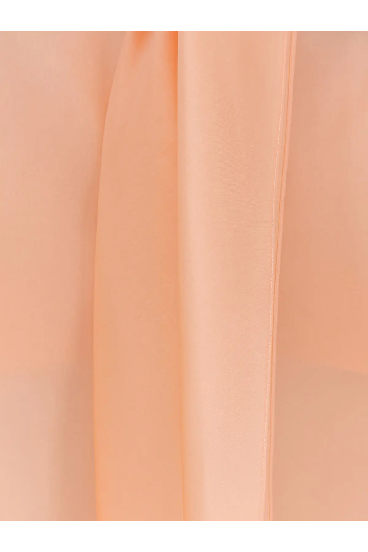 Alberta ferretti women’s silk cape in soft peach pink lightweight fabric with smooth glossy texture shown from back