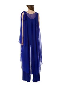 Alberta Ferretti women’s royal blue silk jumpsuit with flowing sheer overlay and draped shoulder paired with wide-leg pants