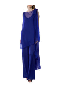 Alberta Ferretti women’s silk jumpsuit in royal blue with a flowing sheer draped top and wide sleeves