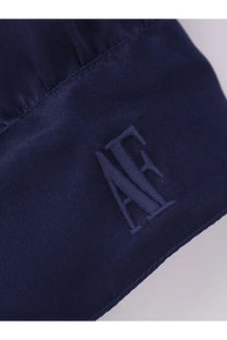 Dark navy satin alberta ferretti womens silk shirt with subtle tonal embroidered logo visible on fabric surface
