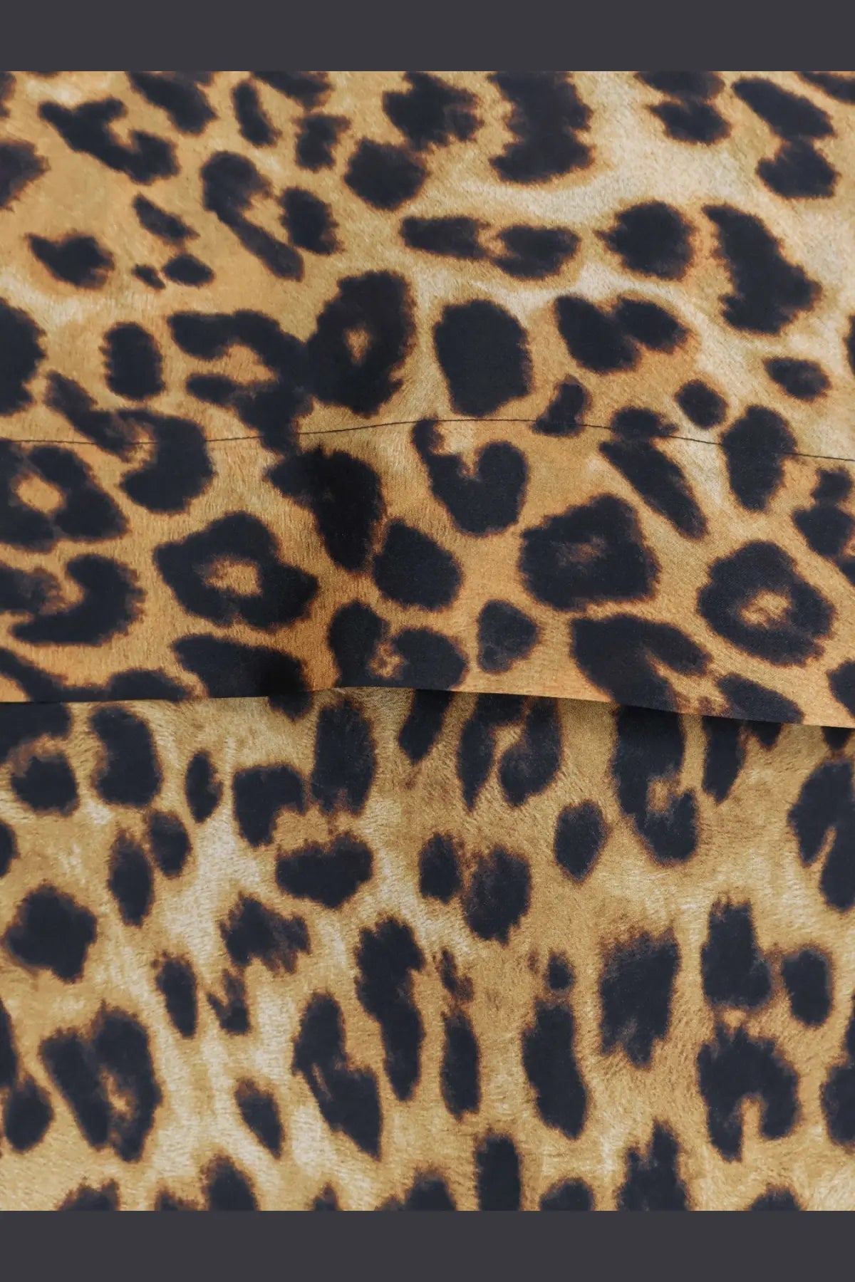 Alberta ferretti women’s silk shirt pattern featuring leopard-print fabric with bold black spots on tan background