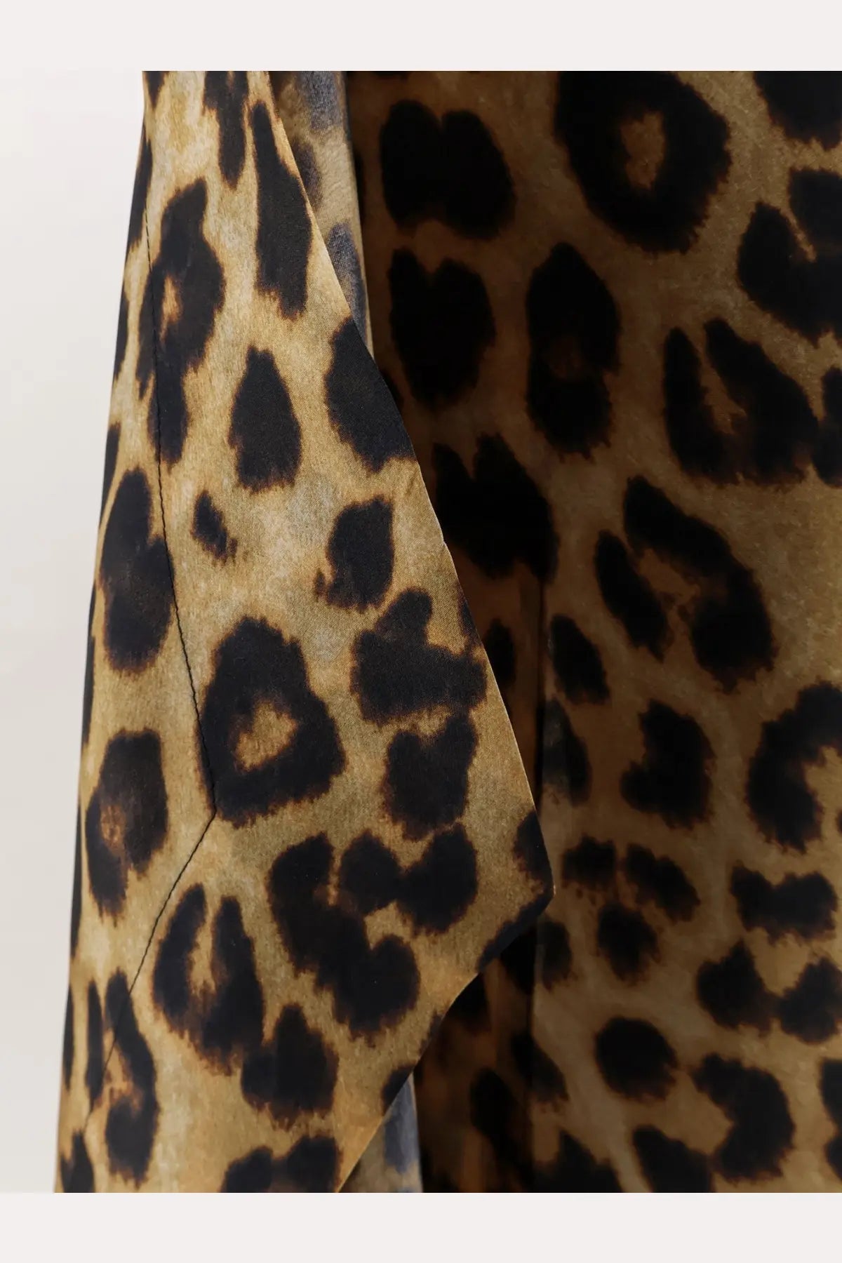 Alberta Ferretti women’s silk skirt with bold tan and black leopard print flowing fabric pattern