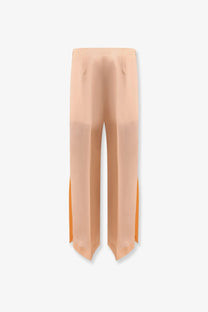 Alberta Ferretti women’s pink silk trousers featuring high-waisted wide-leg fit with subtle sheen and side slit detailing