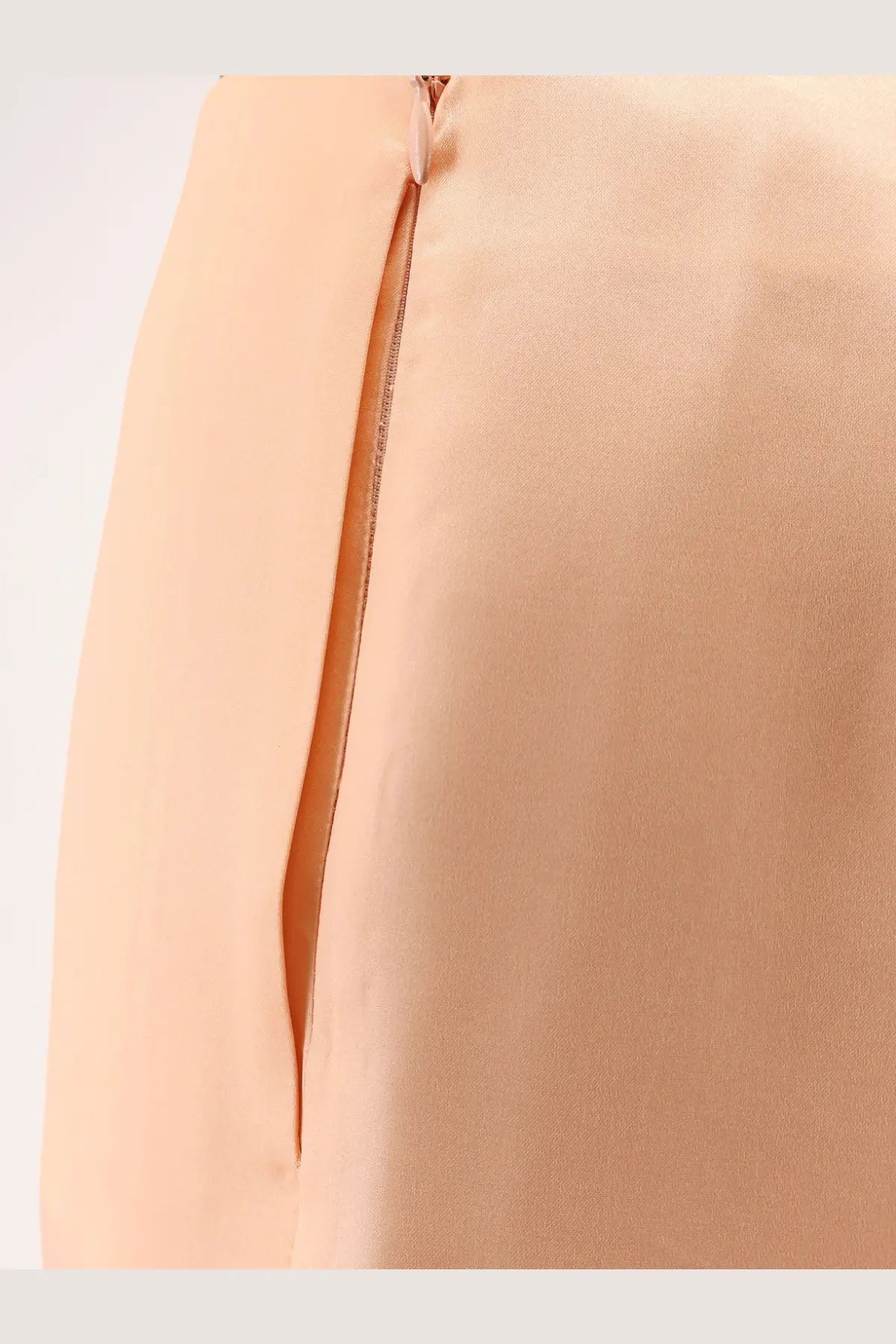 Alberta Ferretti women’s peach satin skirt with subtle sheen and central back zipper visible from the back side