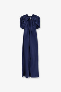 A sleek navy blue satin Alberta Ferretti women’s long dress with puffed short sleeves and a draped neckline