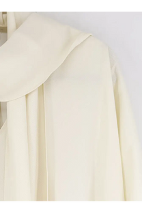 Cream-colored satin blouse with wide soft collar and flowing fabric paired with alberta ferretti white viscose long dress
