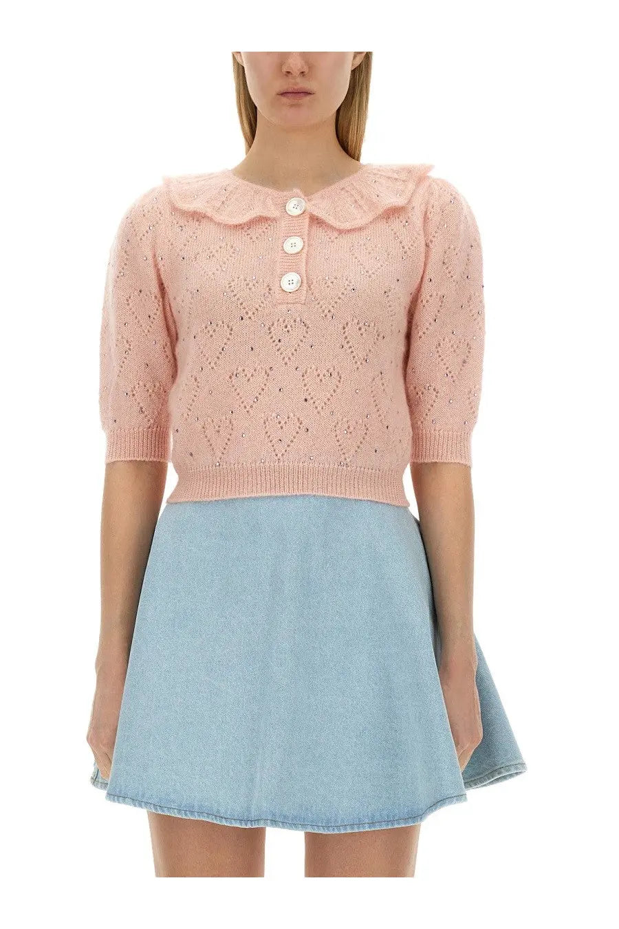 A delicate pink knitted sweater with lace collar heart pattern and three white buttons from Alessandra Rich women’s jersey