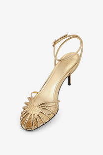 Gold metallic strappy high heel sandal with ankle strap in laminated leather from alevi women’s blake collection