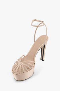 Beige satin skin alevi women’s eva platform sandal with high heel and thin straps forming an intricate pattern
