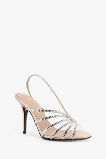 Alevi women’s star xtal satin sandals in silver with strappy high heels and rhinestone detailing on satin skin