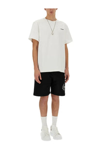 Alexander mcqueen men’s bermuda black with white short-sleeved t-shirt featuring a small black chest logo