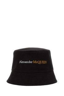 Black Alexander McQueen men’s bucket hat with white and gold embroidered logo on front made from soft fabric