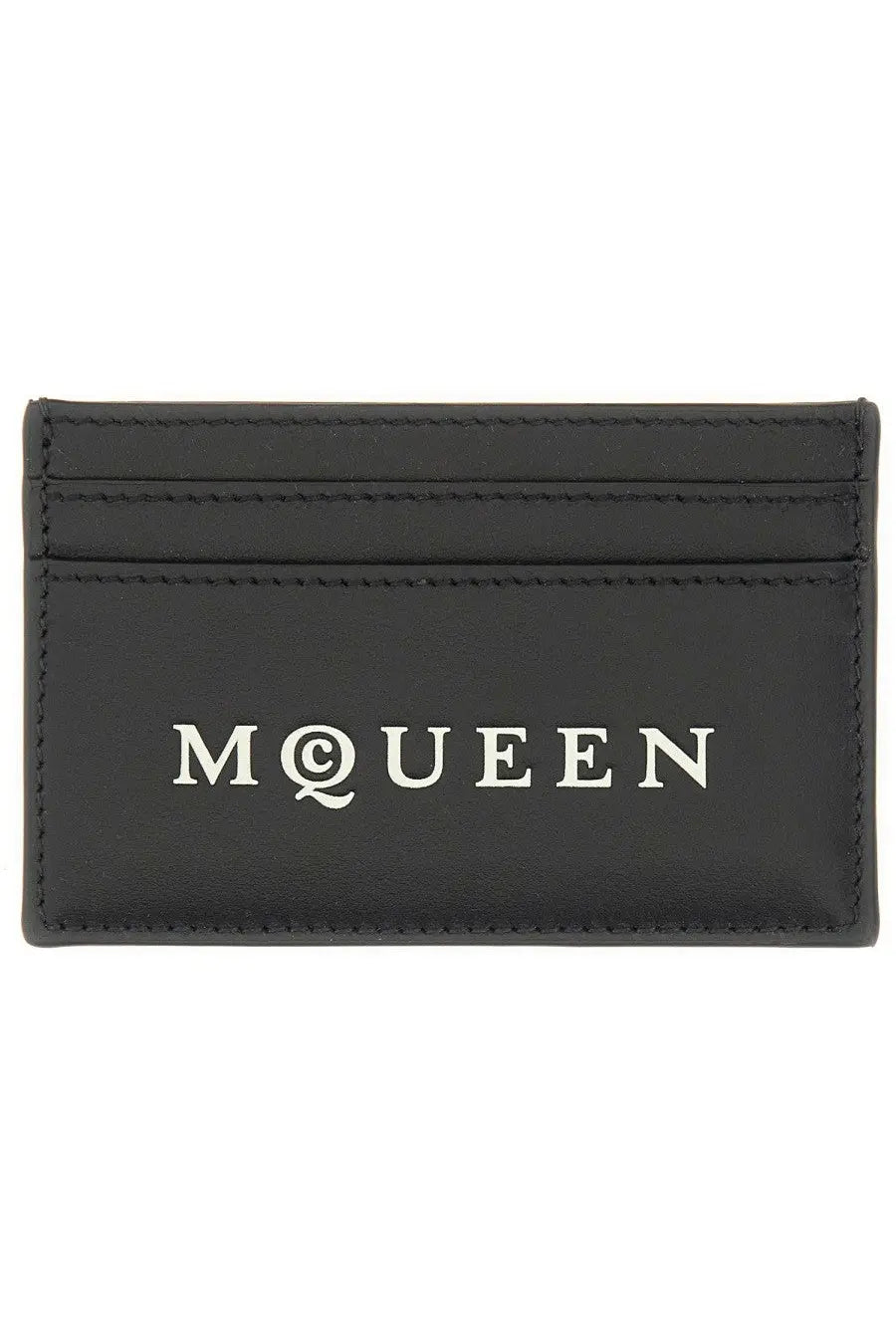 Black leather Alexander McQueen men’s card holder with white mqueen logo on the front