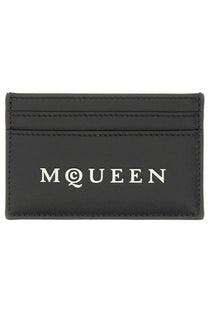 Black leather Alexander McQueen men’s card holder with white mqueen logo on the front