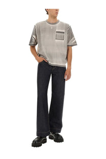 Alexander McQueen men’s cropped gray short-sleeved t-shirt with subtle faded texture and diagonal stripe sleeve accents