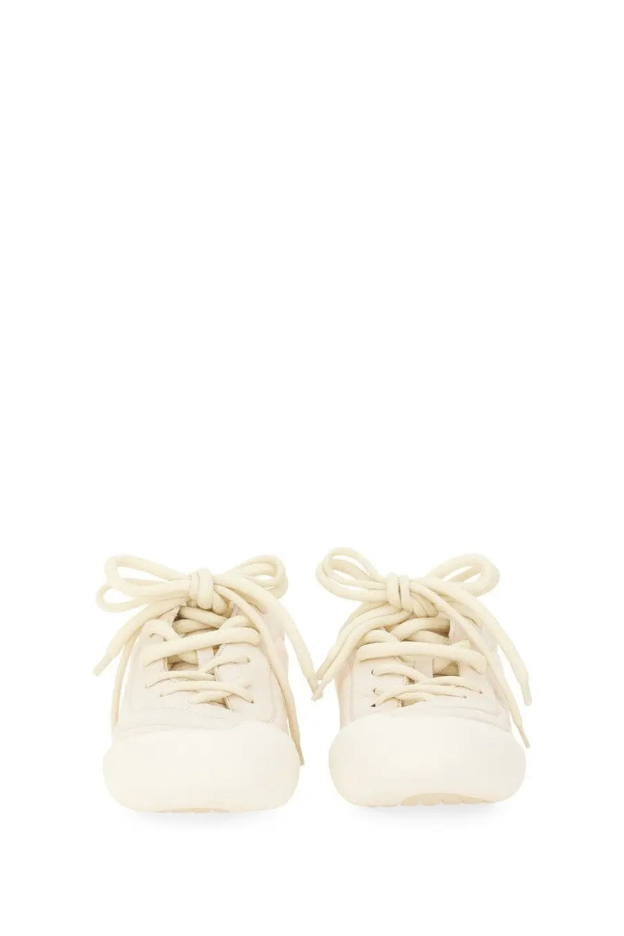 Alexander McQueen men’s Flexion cream-colored canvas sneakers with matching laces tied in bows