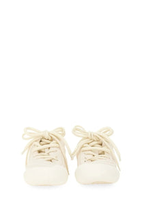 Alexander McQueen men’s Flexion cream-colored canvas sneakers with matching laces tied in bows