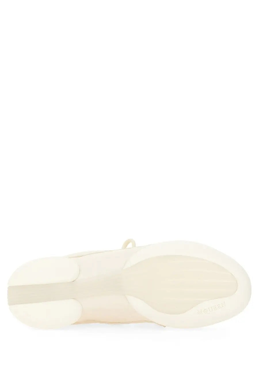 Cream-colored rubber sole with minimalist design and subtle branding on the alexander mcqueen men’s flexion sneaker white