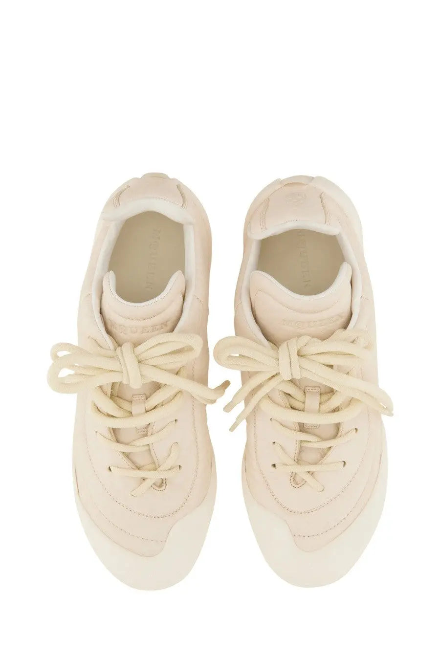 Alexander McQueen men’s Flexion sneaker in cream suede with matching laces and a chunky sole for casual wear
