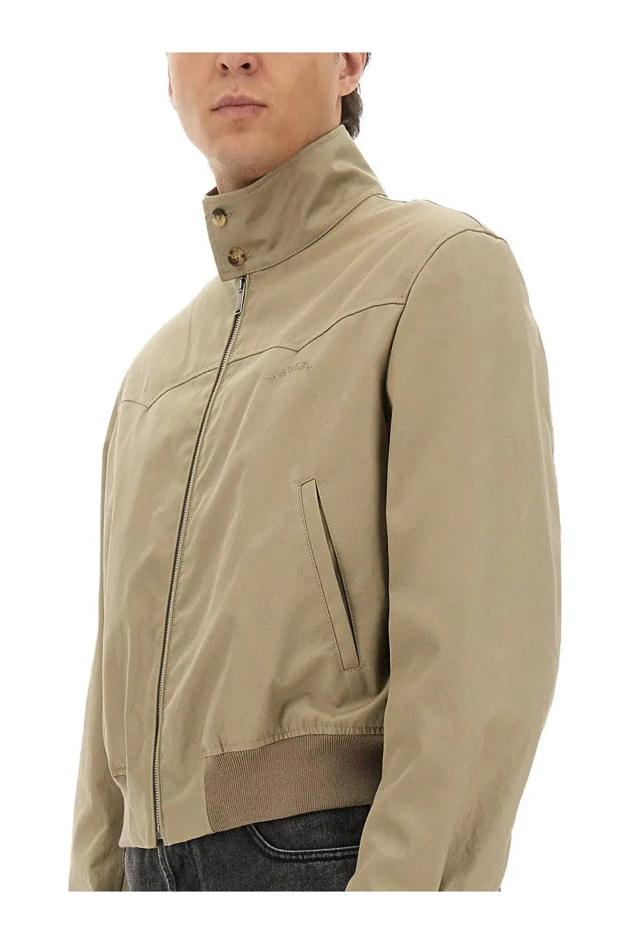 Alexander McQueen men’s beige bomber jacket with stand-up collar zipper closure and subtle chest embroidery