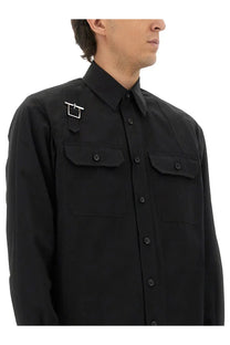 Alexander McQueen men’s black long-sleeved jacket shirt with chest pockets and silver buckle shoulder harness detail