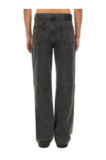 Alexander mcqueen men’s baggy grey denim jeans in dark gray with a faded wash and classic back pockets shown from the back
