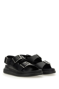 Alexander McQueen men’s black leather sandals with silver buckle straps and chunky platform sole