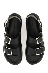 Black Alexander McQueen men’s leather sandal with silver-toned double buckles and a chunky sole