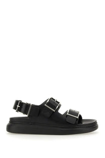 Alexander McQueen men’s black leather sandals with three silver buckle straps and chunky platform sole