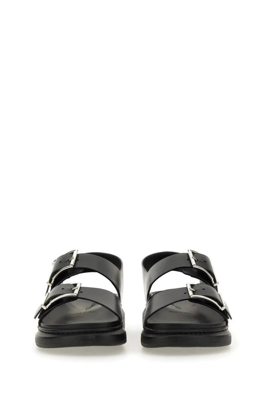 Alexander McQueen men’s black leather sandal with two silver buckle straps and a chunky sole