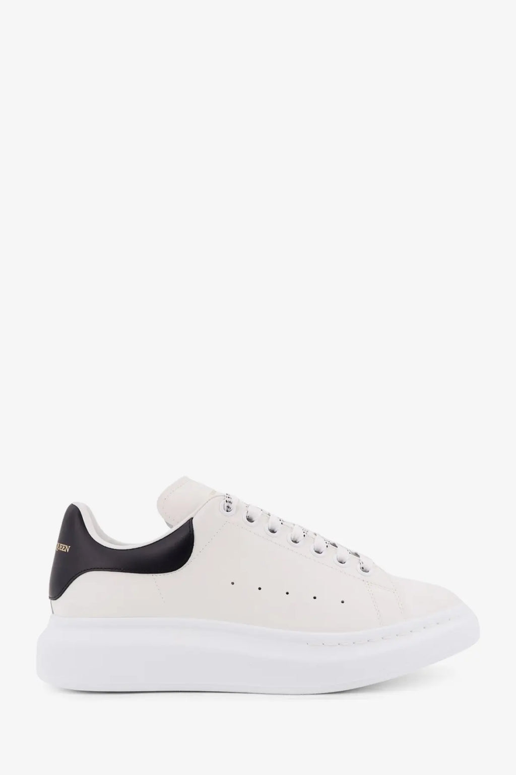 White leather Alexander McQueen men’s low top sneaker with black heel tab and thick white sole showing back side