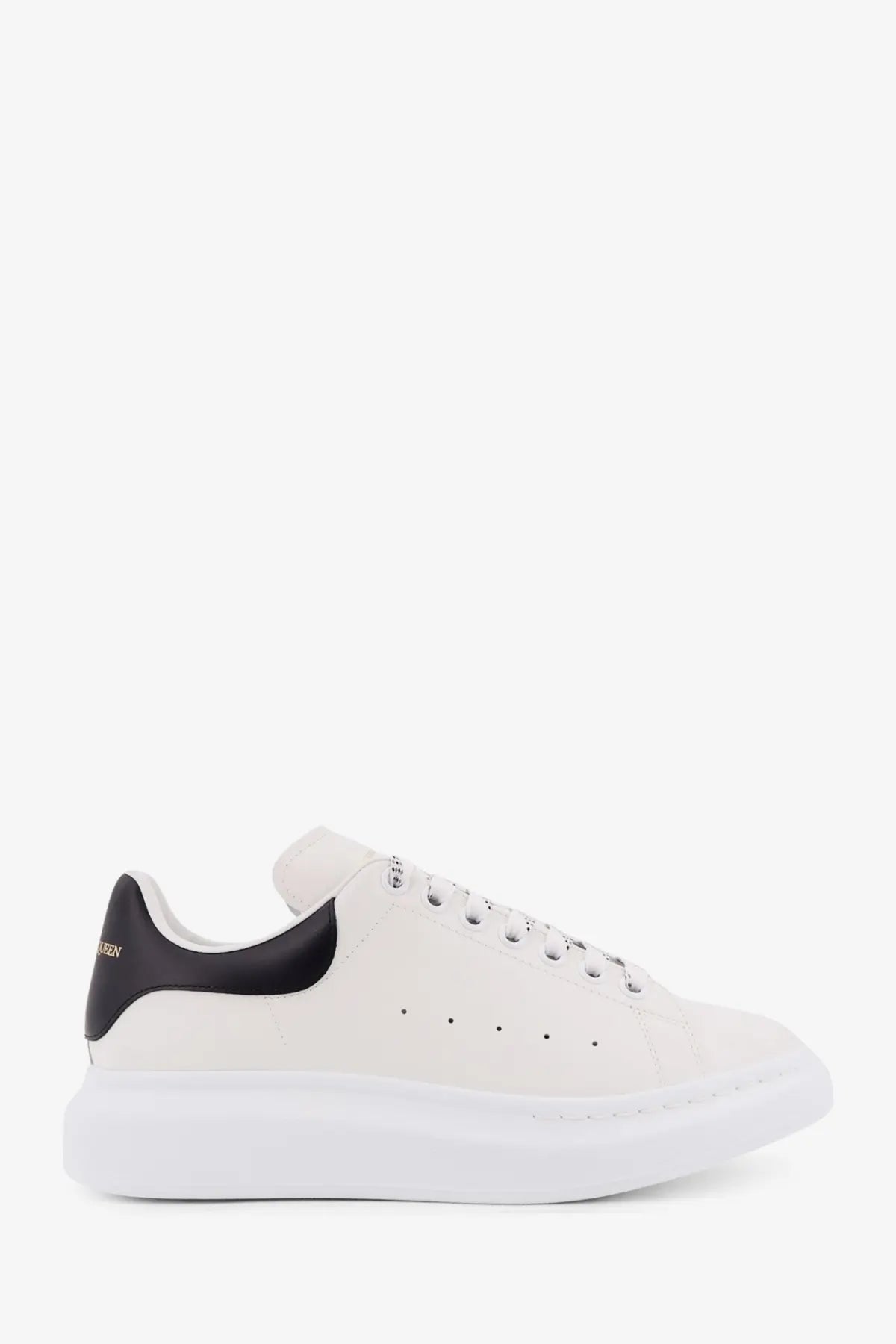 White leather Alexander McQueen men’s low top sneaker with black heel tab and thick white sole showing back side