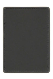 Black leather Alexander McQueen men’s magnetic card holder with neat contrasting stitching along the edges