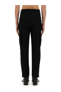 Alexander McQueen men’s black cargo pants with straight-leg cut and prominent side pockets in durable fabric