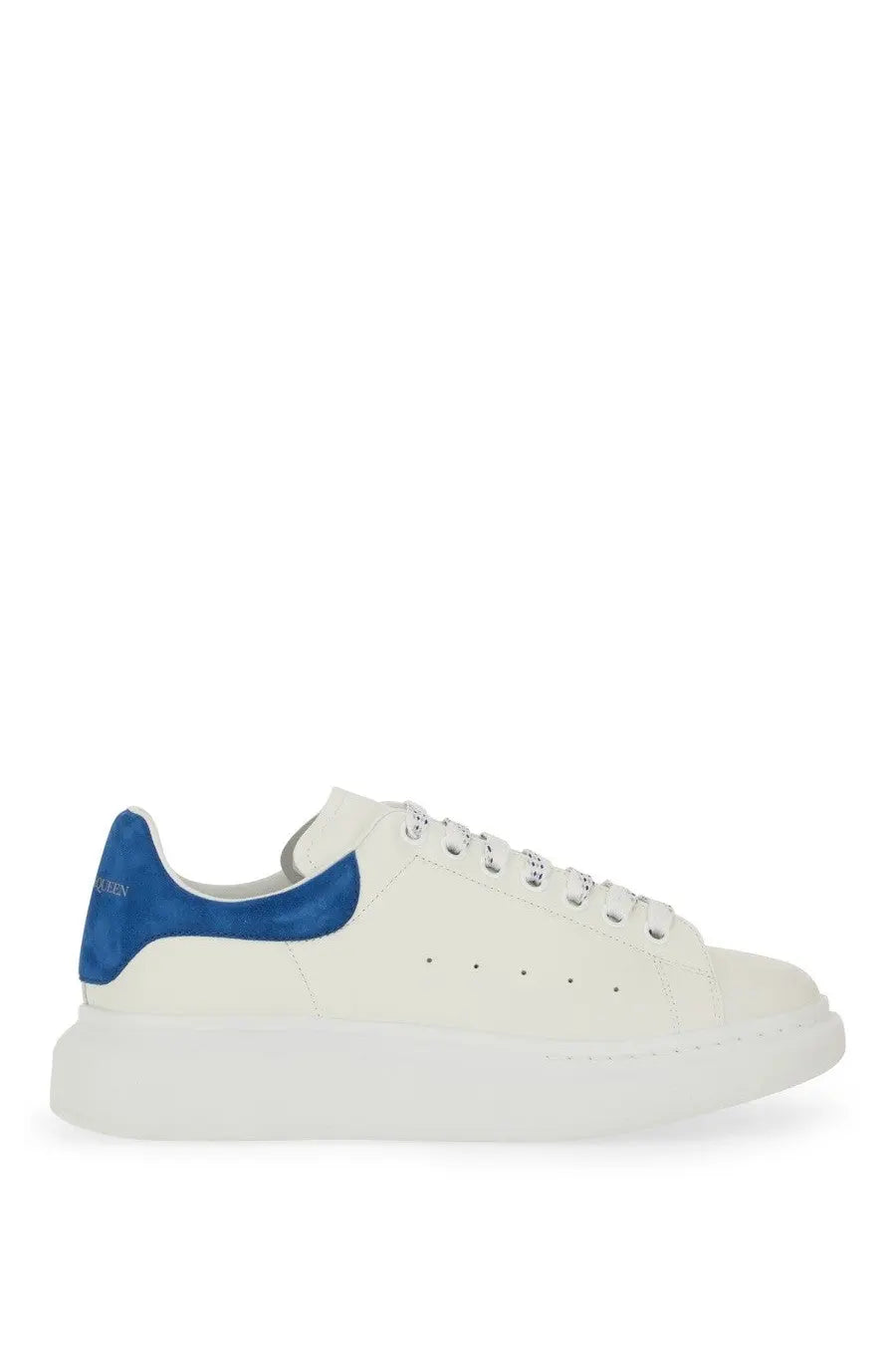 Alexander McQueen men’s oversized white leather sneaker with bold blue suede heel tab and chunky sole